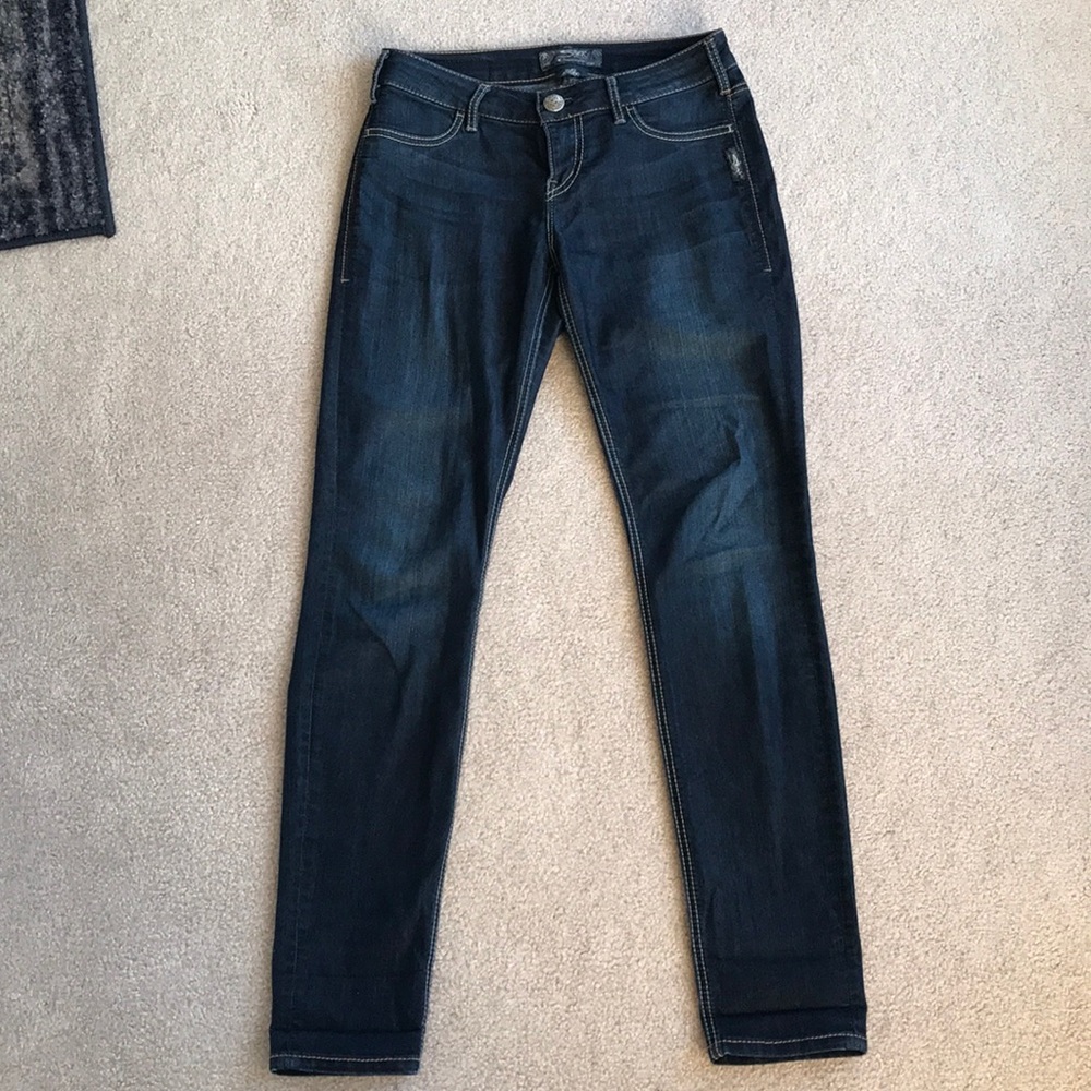 Dark blue Silver jeans.
